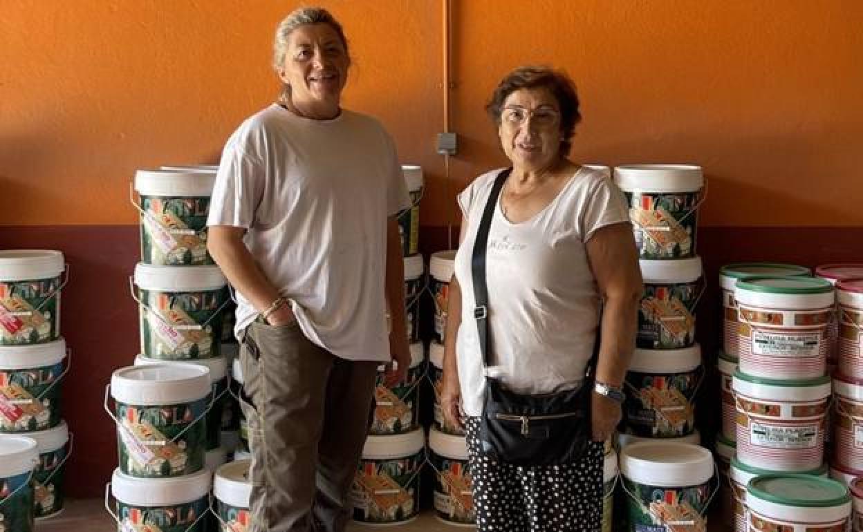 Painting the town white the women restoring their village after the